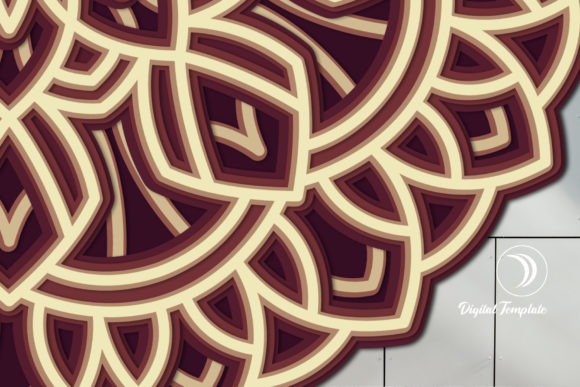 Close-up of the maroon and beige layered mandala showing detailed patterns.