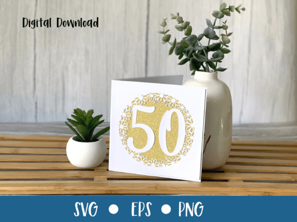 Gold floral 50th birthday SVG card on a wooden table with plants, ideal for Cricut projects.