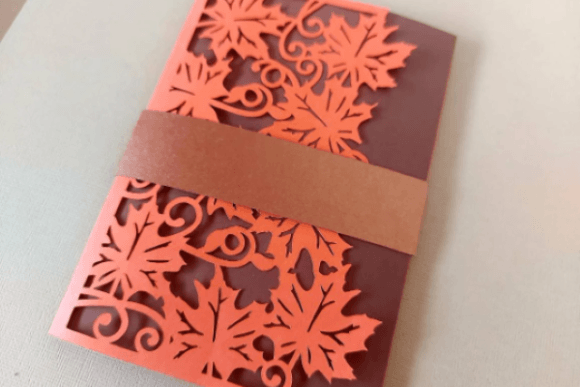 Cricut-compatible SVG of an autumn-themed tri fold card with intricate leaf patterns.
