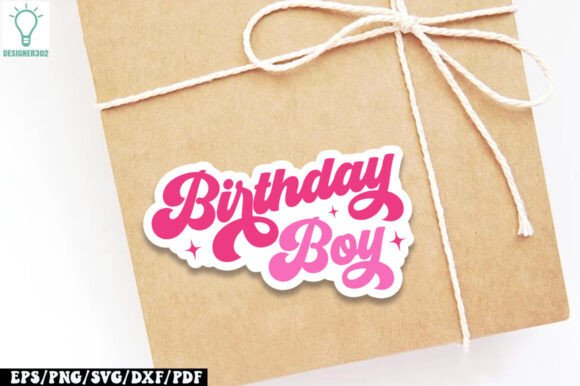 Pink 'Birthday Boy' sticker with stars placed on a wrapped gift box.