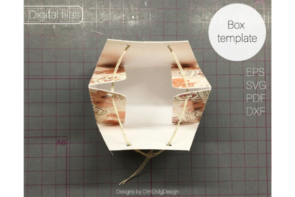 Open pyramid-shaped box showing floral interior design and twine closure.