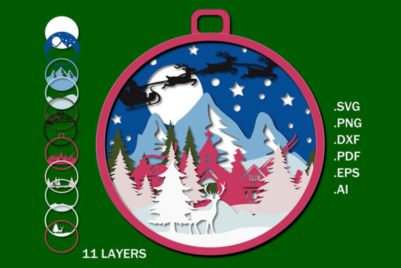 Layered Christmas ornament SVG design showing a winter scene with Santa, reindeer, trees, and a snowy mountain backdrop for Cricut.