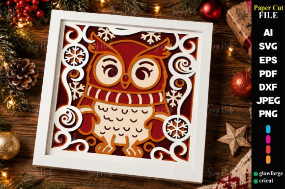 Christmas-themed owl shadow box featuring layered snowflakes