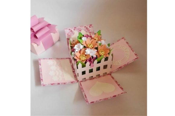 Cricut-compatible SVG of an exploding gift box with paper flowers
