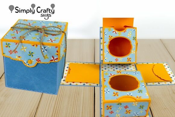 Exploding gift box SVG design for Cricut, featuring two nested boxes