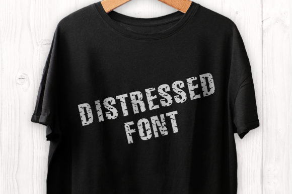 Black t-shirt featuring 'Distressed Font' text in a rugged style, perfect for Cricut crafting.