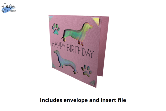Pink folded card with cut-out dachshunds, paw prints, and 'Happy Birthday' text on the front.
