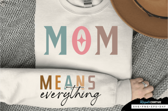 Flat lay of a sweatshirt with 'MOM' in colorful letters and 'MEANS everything' below.