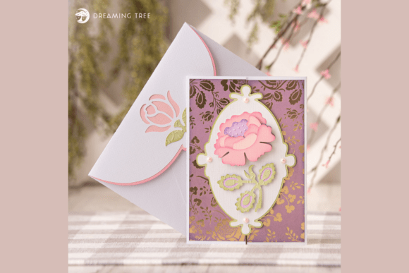 Gatefold card with a pink rose design on a floral background, paired with an envelope featuring a rose motif.