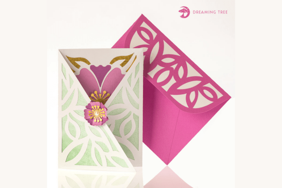 Green and white gatefold card with pink floral design and matching pink envelope.