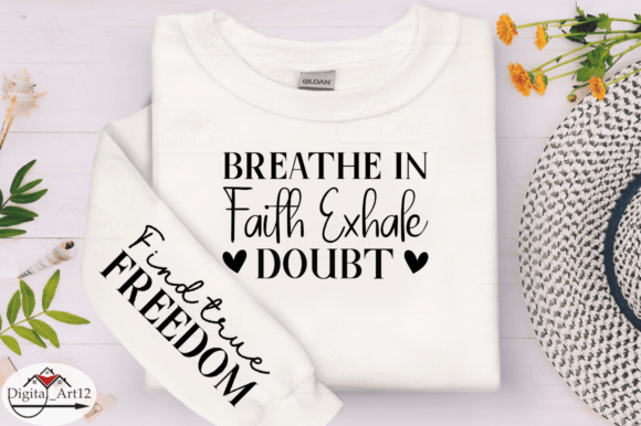 White sweatshirt with 'Breathe in Faith Exhale Doubt' on chest and 'Find true Freedom' on sleeve.