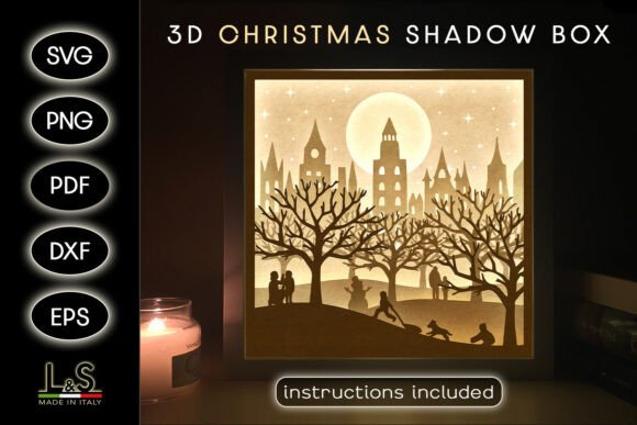 Illuminated 3D Christmas city shadow box with trees and buildings, perfect for Cricut projects