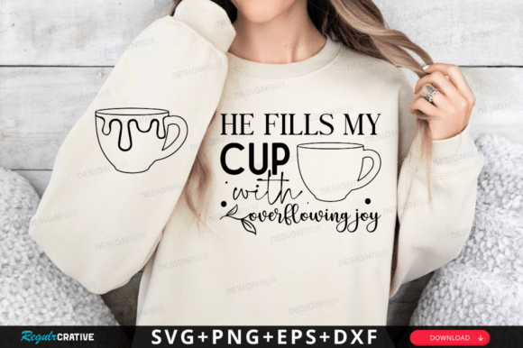 Woman wearing a cream sweatshirt with 'He Fills My Cup with Overflowing Joy' and cup graphics.