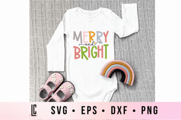 White baby onesie with 'Merry and Bright' in colorful letters, next to pink shoes and a rainbow toy.