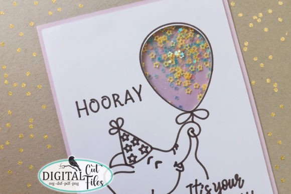 Close-up of elephant birthday card with colorful balloon shaker for Cricut.