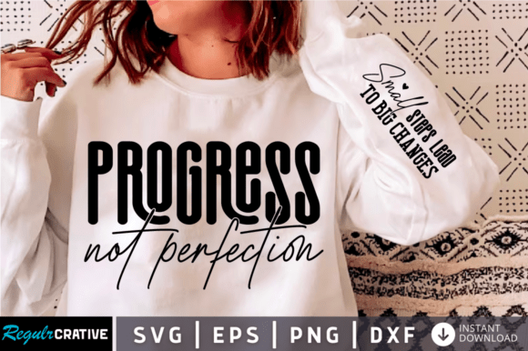 Woman wearing a white sweatshirt with 'Progress not perfection' in bold black text.