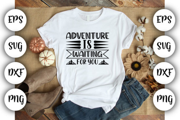 White t-shirt with 'Adventure is Waiting for You' design, surrounded by autumn decor.